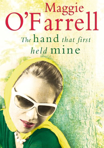 Stock image for The Hand That First Held Mine for sale by Better World Books Ltd