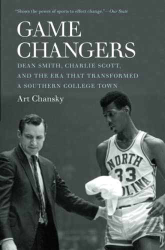 Beispielbild fr Game Changers: Dean Smith, Charlie Scott, and the Era That Transformed a Southern College Town zum Verkauf von BooksRun