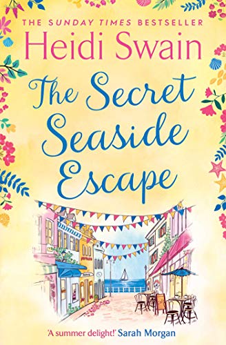 Stock image for The Secret Seaside Escape: Escape to the seaside with the most heart-warming, feel-good romance of 2020, from the Sunday Times bestseller! for sale by AwesomeBooks