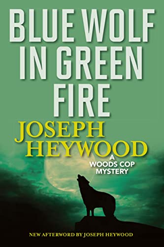 Imagen de archivo de Blue Wolf In Green Fire: A Woods Cop Mystery a la venta por Decluttr