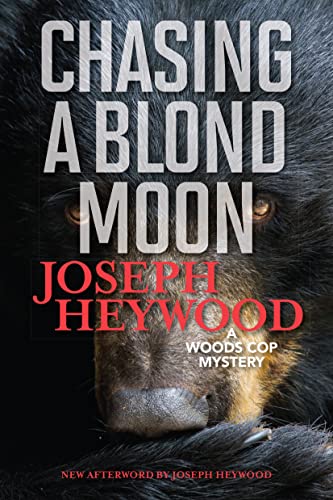 Stock image for Chasing a Blond Moon: A Woods Cop Mystery for sale by Goodwill of Colorado