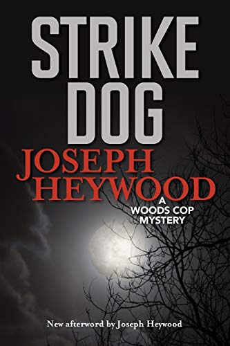 Beispielbild fr Strike Dog: A Woods Cop Mystery zum Verkauf von KuleliBooks