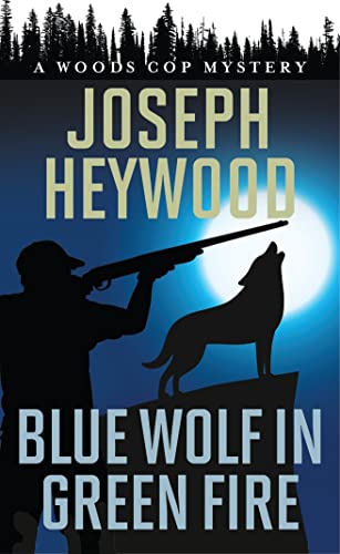 Stock image for Blue Wolf in Green Fire: A Woods Cop Mystery for sale by Half Price Books Inc.