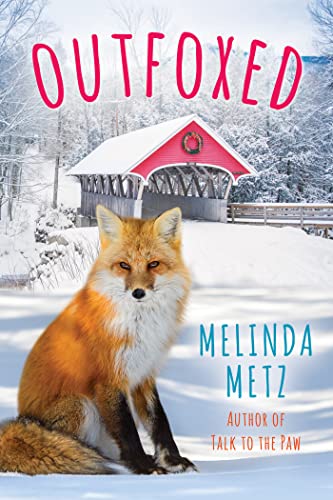 Imagen de archivo de Outfoxed (A Fox Crossing, Maine Novel) a la venta por Wonder Book