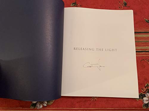 Imagen de archivo de RELEASING THE LIGHT: THE ART OF CAROL EVANS a la venta por WorldofBooks