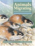 9781553375470: Animals Migrating: How, When, Where and Why Animals Migrate (Animal Behavior)