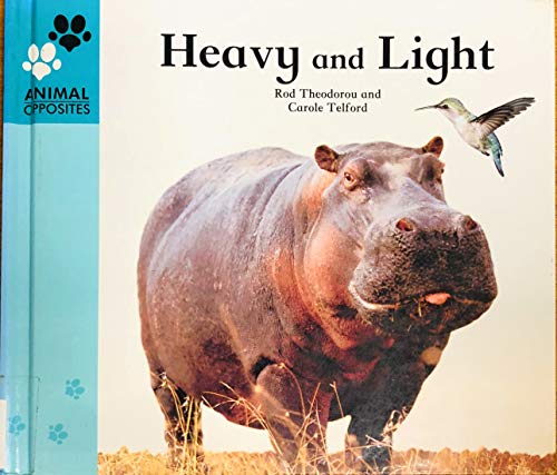 Imagen de archivo de Heavy and Light (Animal Opposites) a la venta por HPB Inc.