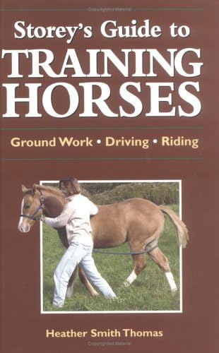 Imagen de archivo de Storeys Guide to Training Horses (Storeys Guide to Raising) a la venta por Blue Vase Books