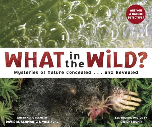 Imagen de archivo de What in the Wild? : Mysteries of Nature Concealed . and Revealed a la venta por Better World Books