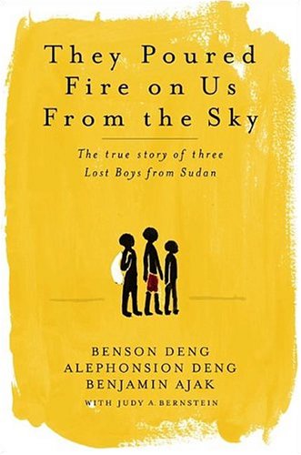 Imagen de archivo de They Poured Fire on Us from the Sky: The Story of Three Lost Boys from Sudan (signed) a la venta por Andrew's Books