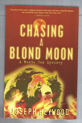 Imagen de archivo de Chasing a Blond Moon: A Woods Cop Mystery (Woods Cop Mysteries) a la venta por Wonder Book
