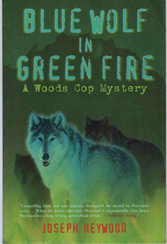 Stock image for Blue Wolf in Green Fire: A Woods Cop Mystery (Woods Cop Mysteries) for sale by Wonder Book