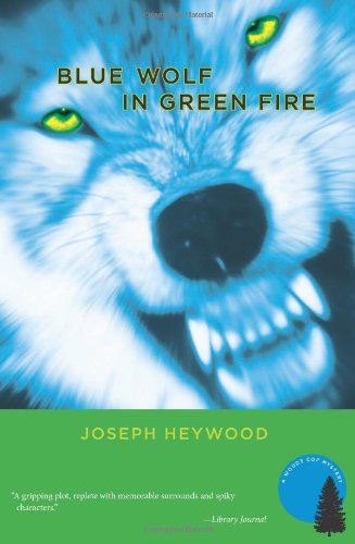 Imagen de archivo de Blue Wolf In Green Fire: A Woods Cop Mystery (Woods Cop Mysteries) a la venta por SecondSale