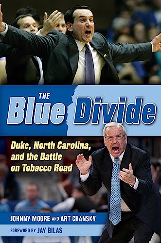 Beispielbild fr The Blue Divide: Duke, North Carolina, and the Battle on Tobacco Road zum Verkauf von ThriftBooks-Atlanta