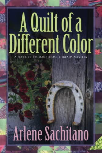Beispielbild fr A Quilt of a Different Color (A Harriet Truman/Loose Threads Mystery) zum Verkauf von BooksRun