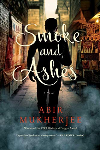 Imagen de archivo de Smoke and Ashes: A Novel (Wyndham & Banerjee Mysteries) a la venta por Half Price Books Inc.