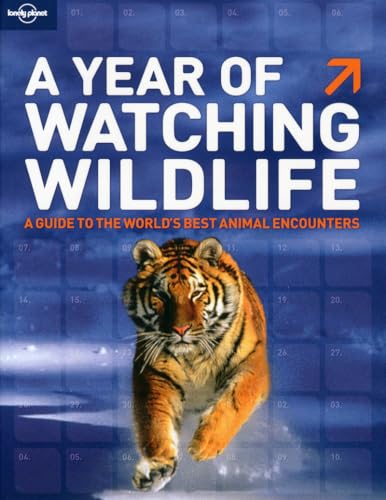 Stock image for A Year of Watching Wildlife: A Guide to the World's Best Animal Encounters (General Reference Guide) for sale by WorldofBooks