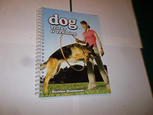 Imagen de archivo de dog tricks & training with dvd a la venta por ThriftBooks-Atlanta