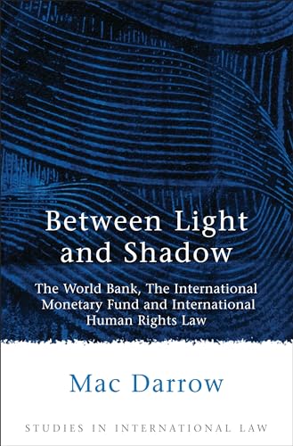 Beispielbild fr Between Light and Shadow: The World Bank, The International Monetary Fund and International Human Rights Law: 1 (Studies in International Law) zum Verkauf von WorldofBooks
