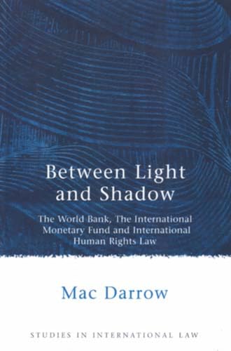 Stock image for Between Light and Shadow: The World Bank, the International Monetary Fund and International Human Rights Law for sale by Chiron Media