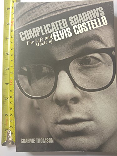 Imagen de archivo de Complicated Shadows: The Life and Music of Elvis Costello a la venta por BooksRun
