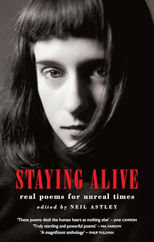 Stock image for Staying Alive: Real Poems for Unreal Times for sale by Jenson Books Inc