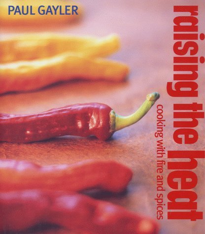 Imagen de archivo de Raising the Heat : Cooking with Fire and Spice a la venta por Sarah Zaluckyj
