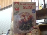 Imagen de archivo de Feast Yourself Slim (Kitchen Collection S.) a la venta por Goldstone Books