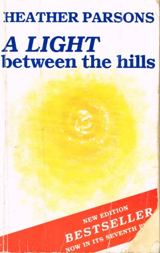 Stock image for A Light between the Hills for sale by WorldofBooks