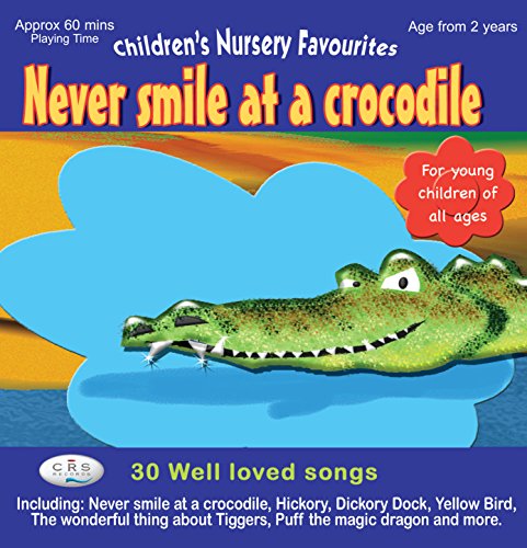 Imagen de archivo de Never Smile at a Crocodile - Well loved children's songs a la venta por WorldofBooks
