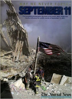 Beispielbild fr May We Never Forget September 11: The incredible photographic account of the hours, days, weeks and months following the horrific events of September 11, 2001 zum Verkauf von ThriftBooks-Dallas