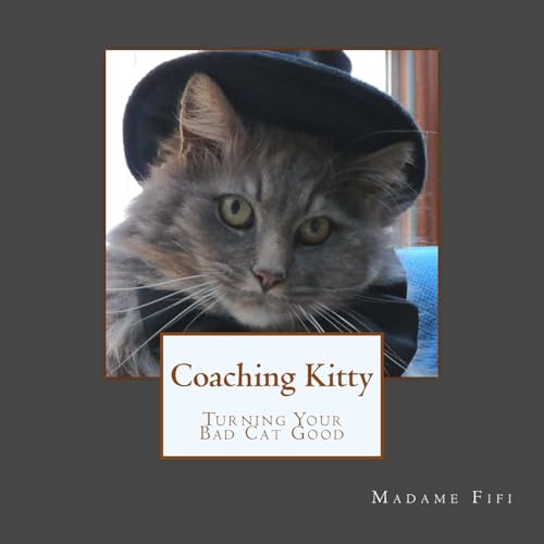 Beispielbild fr Coaching Kitty: Turning Your Bad Cat Good zum Verkauf von THE SAINT BOOKSTORE
