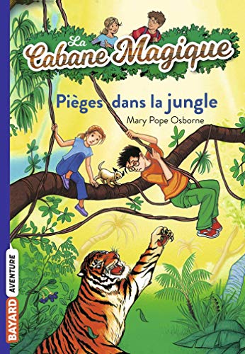 Imagen de archivo de La cabane magique, Tome 18: Piges dans la jungle a la venta por Librairie Th  la page