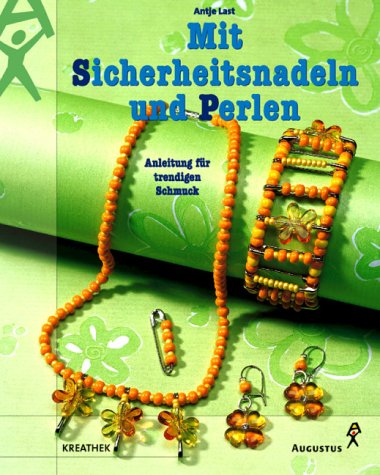 Mit Sicherheitsnadeln und Perlen